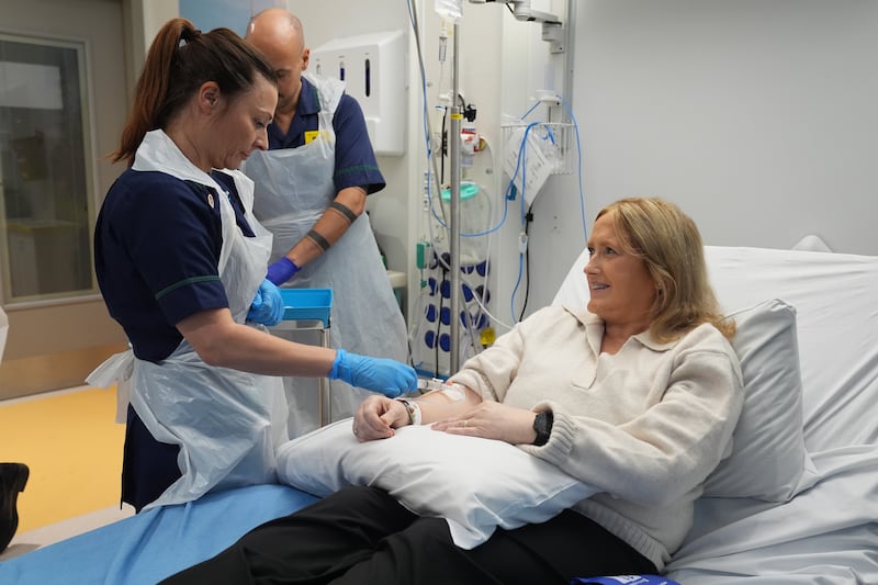 Senior clinical practice facilitator Nicole Prescott administers breakthrough treatment to patient Katie Tinkler for lupus at University College London Hospital in London