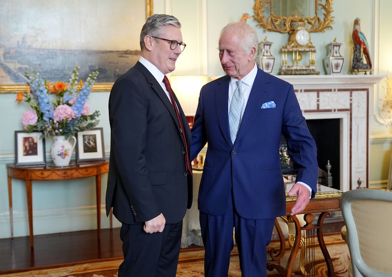 The King speaks with Sir Keir Starmer during an audience at Buckingham Palace, London, where he invited the leader of the Labour Party to become Prime Minister