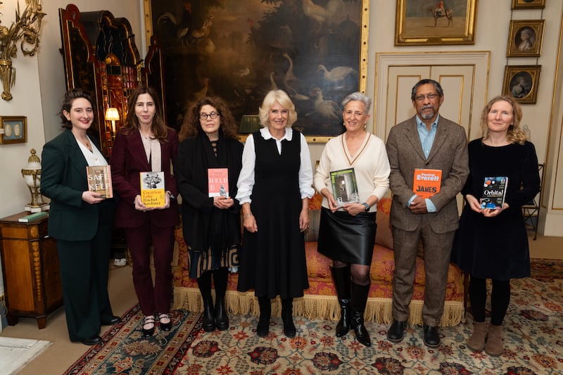 Left to right, Yael van der Wouden, Rachel Kushner, Anne Michaels, Queen Camilla, Charlotte Wood, Percival Everett and Samantha Harvey during a reception for the Booker Prize Foundation at Clarence House