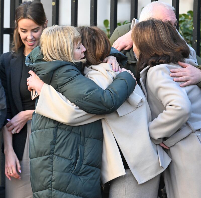 Families of the 'Clonoe Four' leave the Coroner's Court in Belfast with their legal representatives following the report of findings into the deaths of four provisional IRA members shot dead in an SAS ambush at Clonoe, near Coalisland in County Tyrone in February 1992.