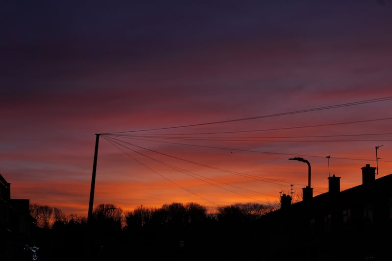 The sun sets over Liverpool on Christmas Eve