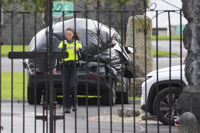 A car wrapped in plastic at the scene at Renmore Barracks in Co Galway