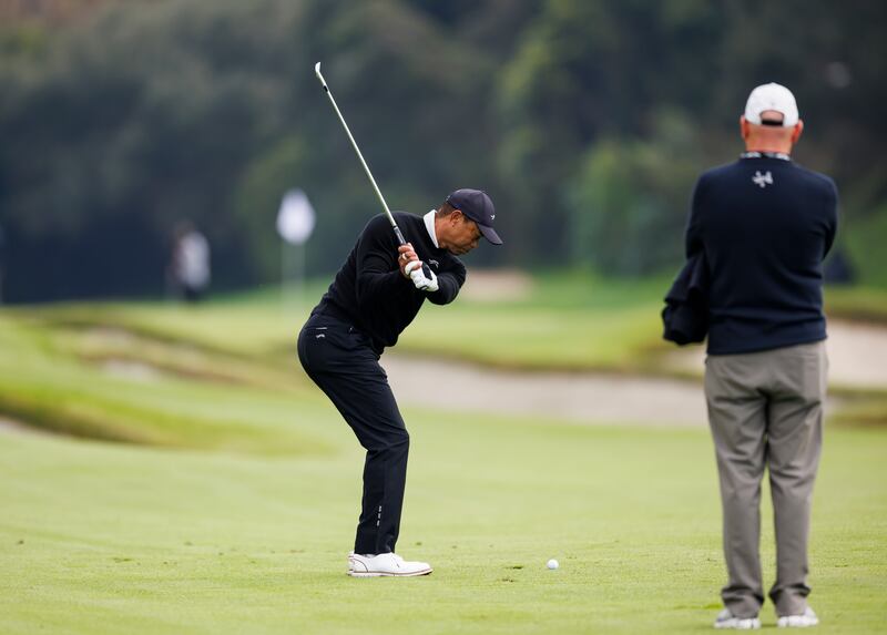 Tiger Woods plays a shot at Riviera Country Club (Ryan Kang/AP)