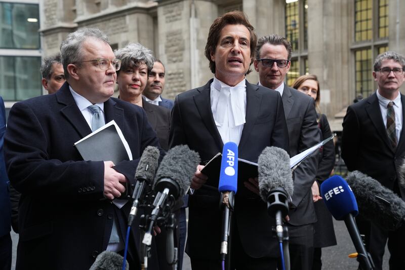 Lord Tom Watson (left) and the Duke of Sussex’s barrister, David Sherborne speak to the media