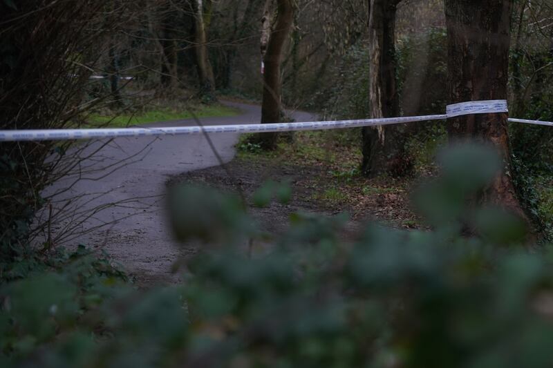 Police tape near the wooded area at Santry Demesne, Dublin