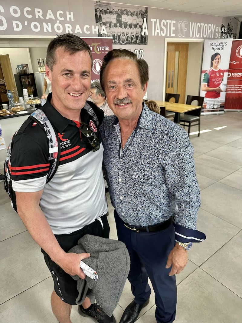 Former Tyrone defender Mickey Hughes, an Ulster medallist in 1973 and former Ulster U21-winning captain the same year, pictured with Brian McGuigan in Healy Park on a recent trip home for the 70-year-old, who moved to Kentucky in 1981.