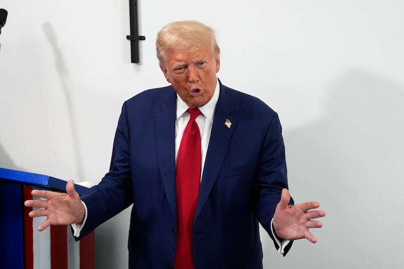 Republican presidential nominee and former president Donald Trump speaks during a stop at a campaign office in Roseville, Michigan (Carolyn Kaster/AP)