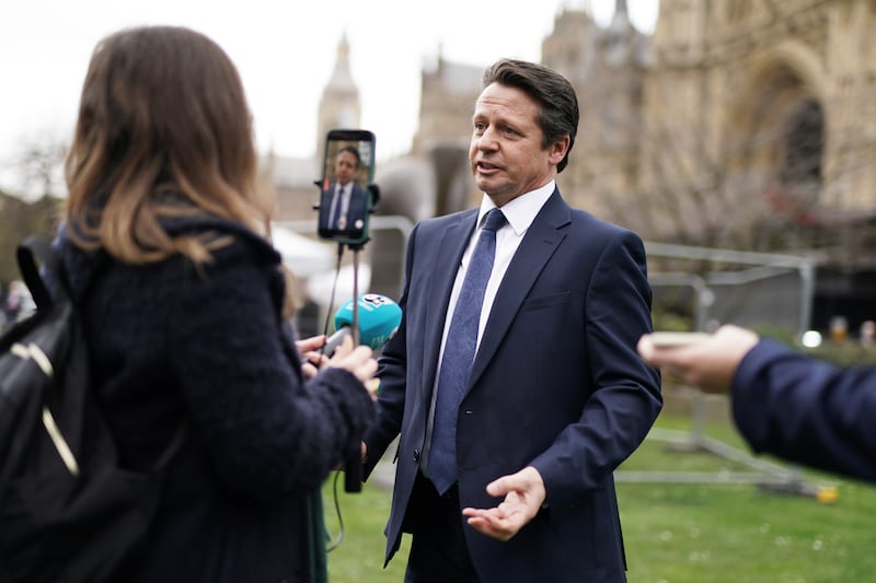 Nigel Huddleston speaks to reporters after the Budget