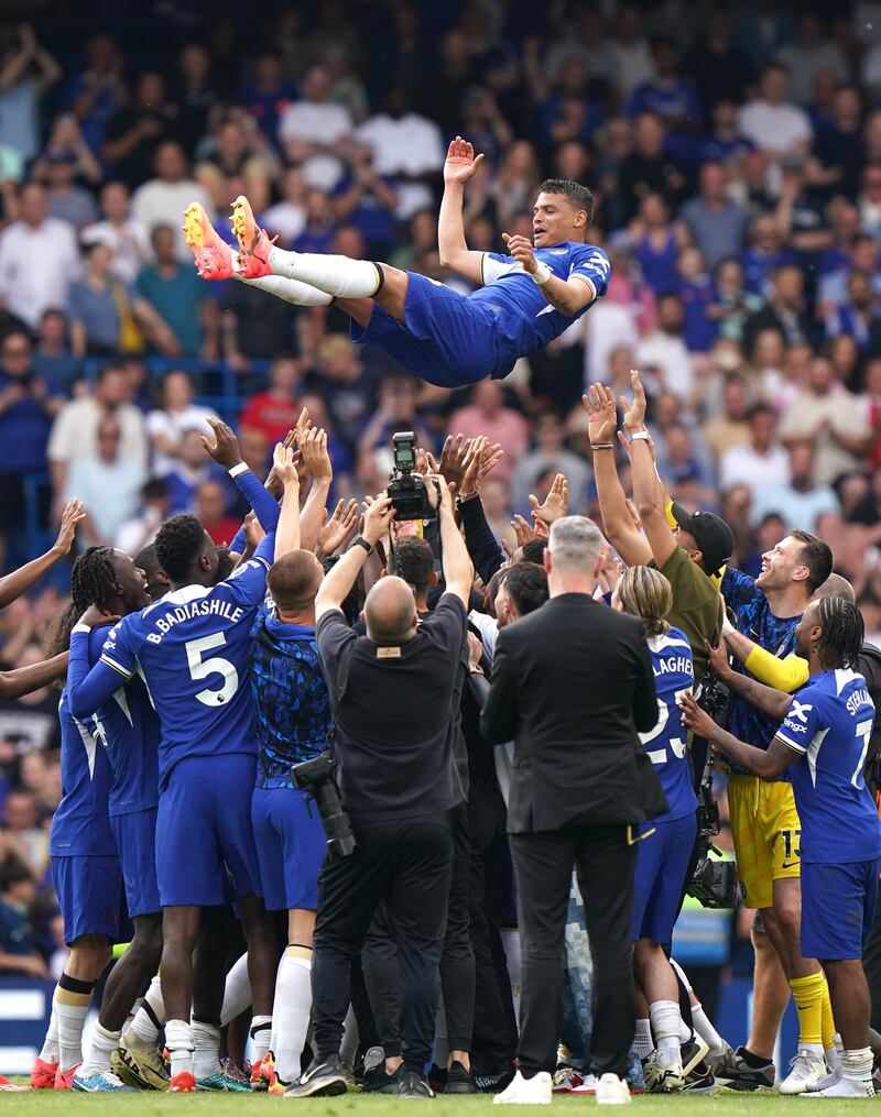 Chelsea’s Thiago Silva is thrown into the air by his team-mates after the final whistle