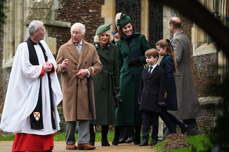 Charles speaks to the vicar following the service at St Mary Magdalene Church