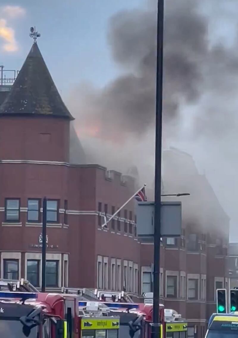 Firefighters tacking the blaze at Forest Gate police station