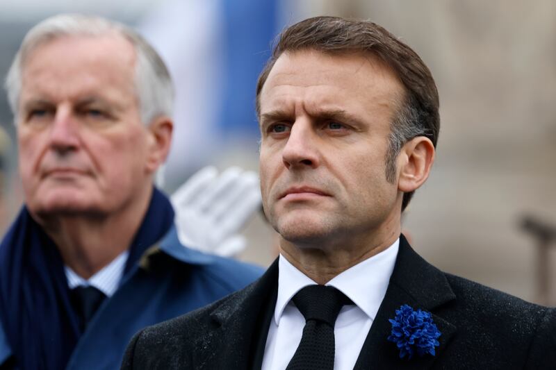 Emmanuel Macron, right, will remain France’s president ( Ludovic Marin, Pool via AP, File)