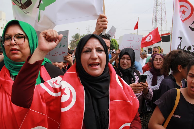 Protesters called for migrants to be returned home (Houssem Zouari/AP)