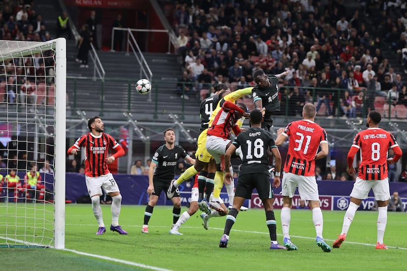 Ibrahima Konate, centre right, rises highest to head Liverpool’s equaliser against AC Milan