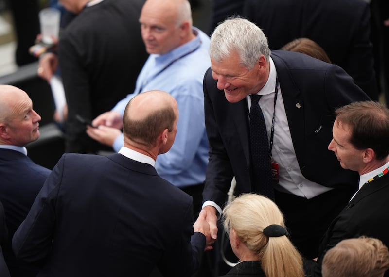 The Prince of Wales (left) greets David Gill in the stands before the UEFA Euro 2024 match at the Frankfurt Arena in Frankfurt, Germany. PA.