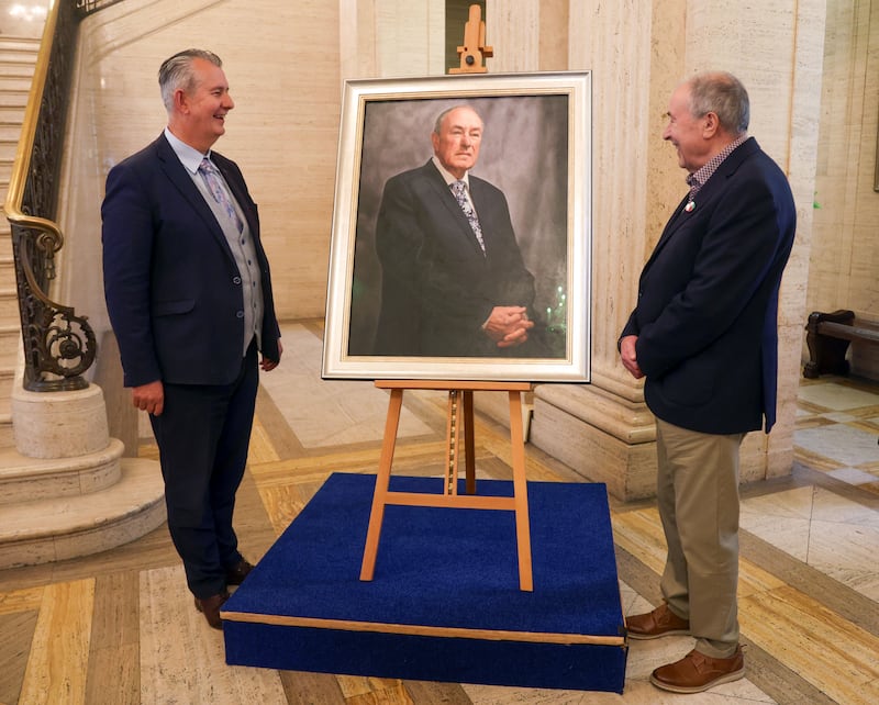 Former Speaker of the Assembly Mitchel McLaughlin at the  unveiling of his new portrait  at Stormont Parliament Buildings on Tuesday.
PICTURE COLM LENAGHAN