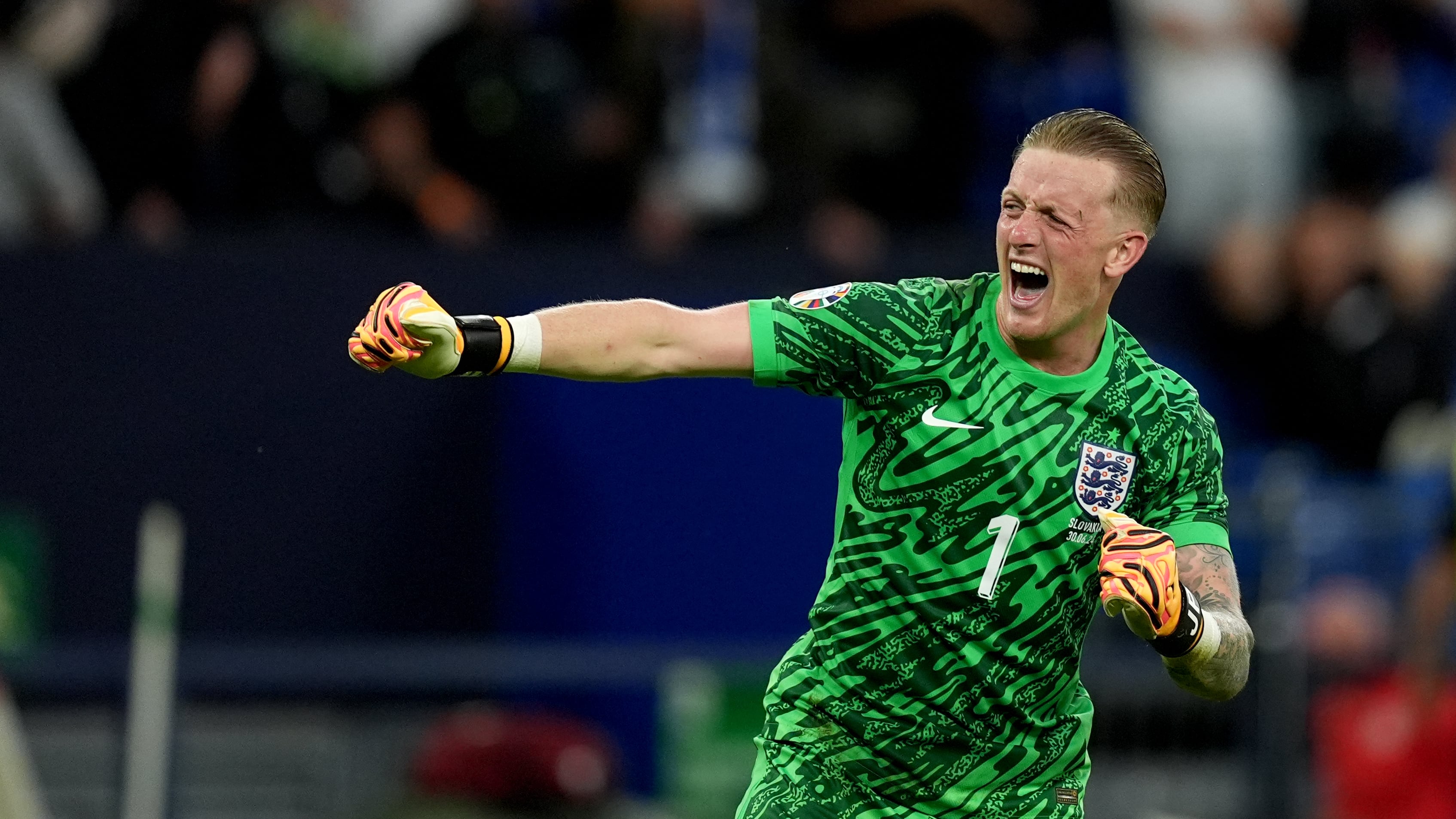 England goalkeeper Jordan Pickford celebrates after the Euro 2024 win over Slovakia.