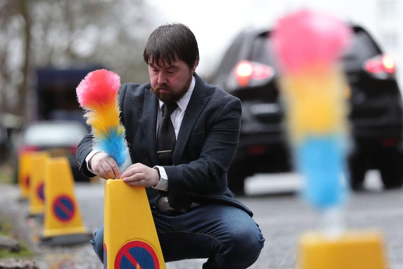 Tickling sticks are placed outside the home of Sir Ken Dodd in Knotty Ash (Aaron Chown/PA)