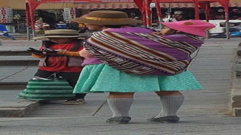 Shopping in Ollantaytambo, a town inhabited since the 16th century when it became a stronghold for Inca resistance to the conquistadors.