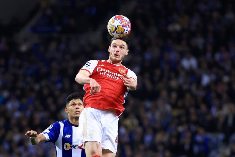 Arsenal’s Declan Rice heads the ball next to Porto’s Evanilson (Luis Vieira/AP)