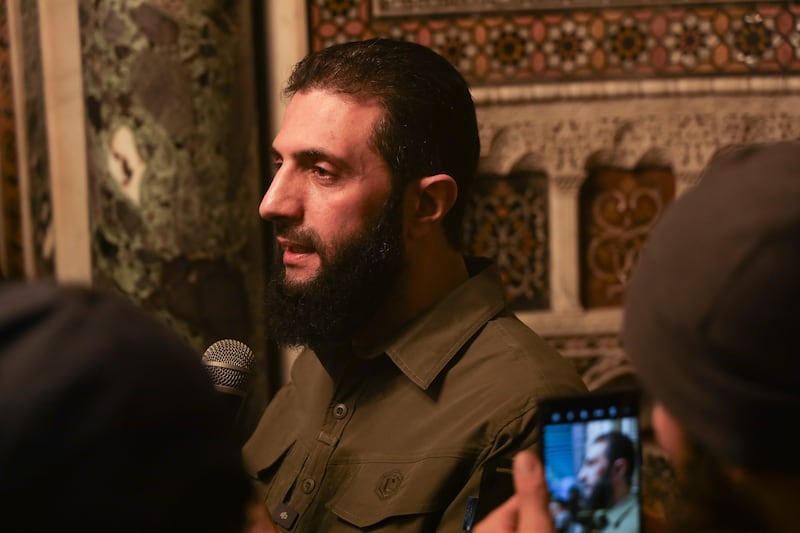 Ahmad al-Sharaa’s rebel faction has promised representative government and religious tolerance, including announcing that they will not tell women how to dress (Omar Albam/AP)