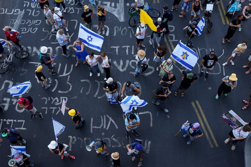 Demonstrators in Tel Aviv Israel demand a ceasefire deal and the immediate release of hostages held by Hamas in the Gaza Strip after the deaths of six hostages in the Palestinian territory (Ohad Zwigenberg/AP)