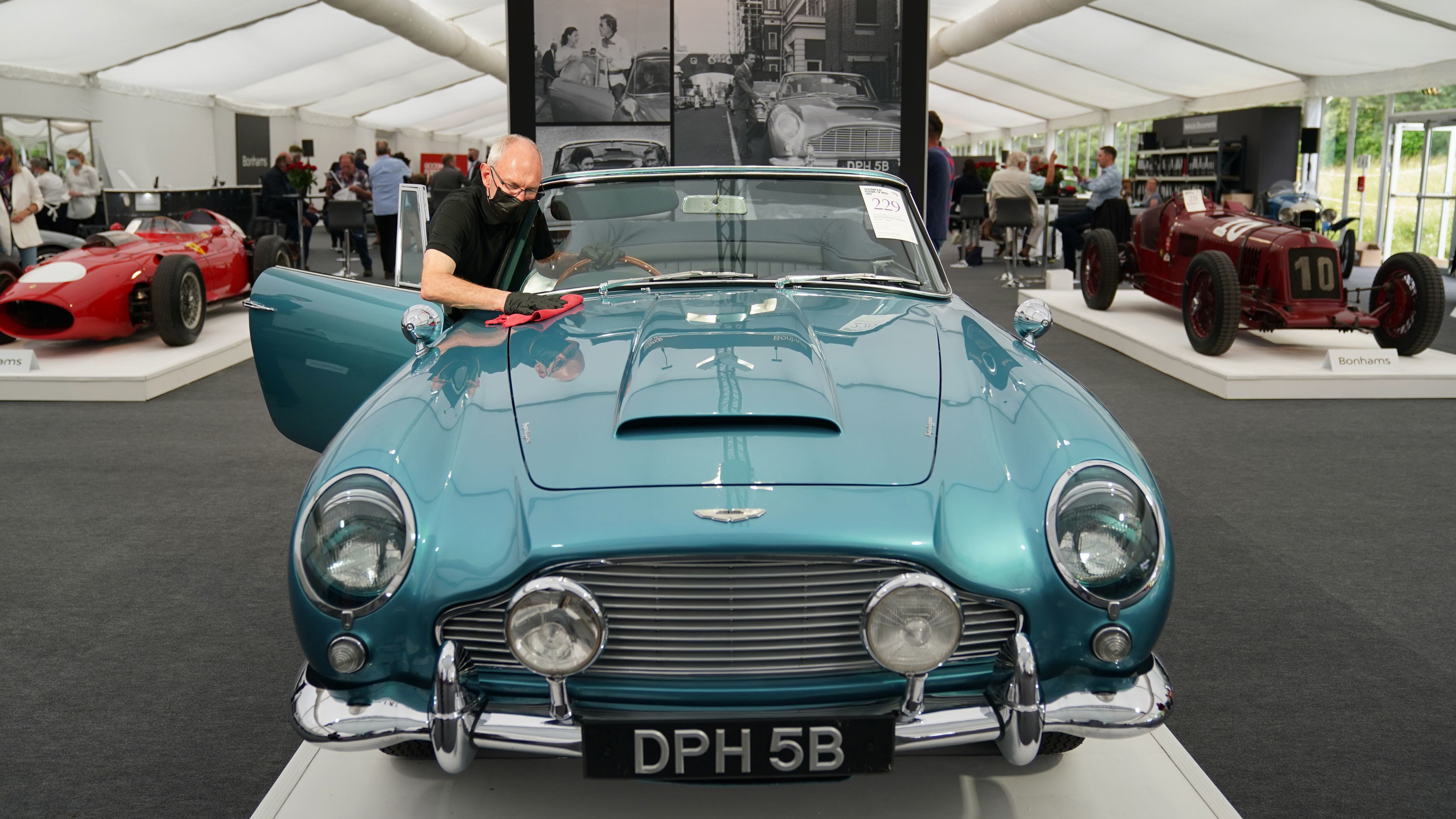 The 1964 DB5 convertible, which has carried a bevy of high society stars, could fetch up to £1.7m.
