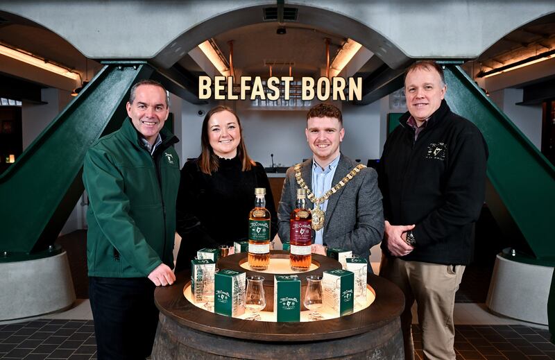 L-R: John Kelly, CEO of Belfast Distillery Company; operations manager Claire Crerand; Cllr Ryan Murphy; and Graeme Millar master distiller at the new McConnell’s Distillery.