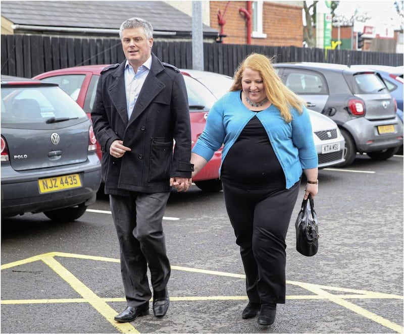 Naomi Long Alliance Party and her husband Michael on the way into a polling station in Belfast. She has told the Irish News that he was the only person who knew about the extent of her illness. Picture by Hugh Russell. 