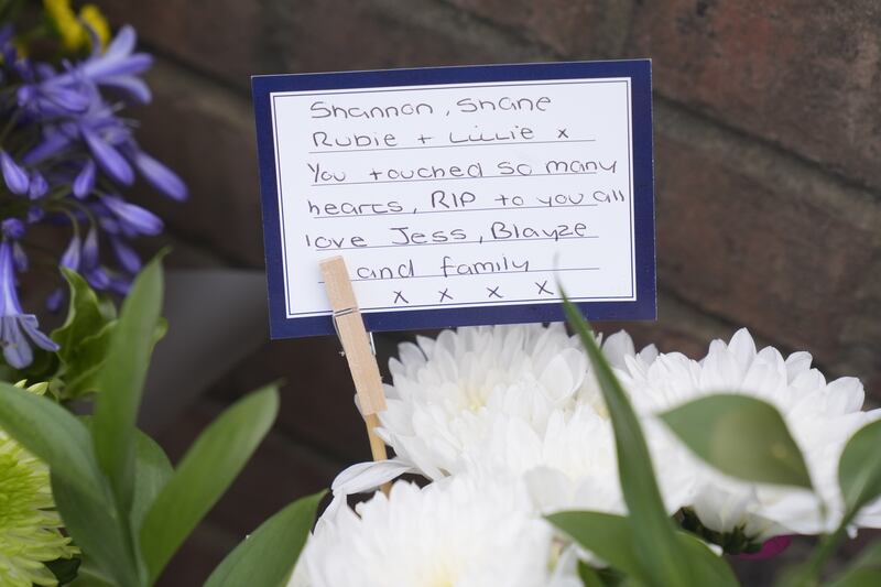 Flowers and tributes laid near the scene on the A61