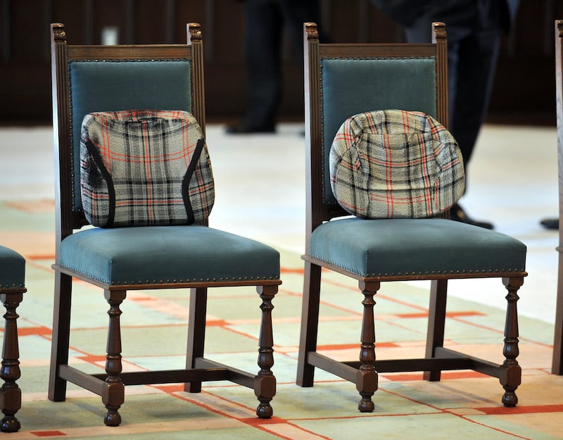 The tartan seat cushions put in place for Charles and Camilla during a royal tour of Tokyo