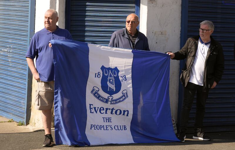 Everton fans pay tribute to Kevin Campbell ahead of the service .