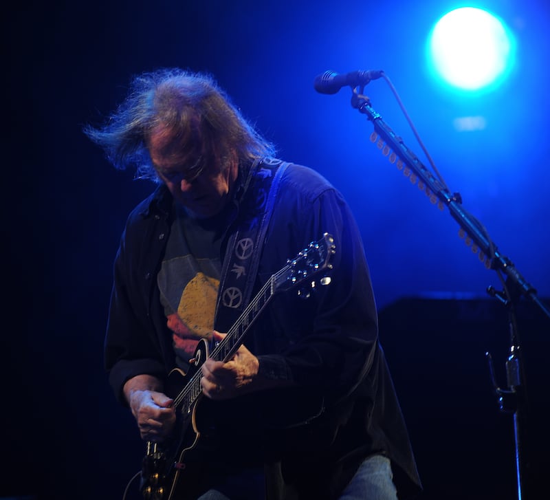 Neil Young performing on the Pyramid Stage during the 2009 Glastonbury Festival at Worthy Farm