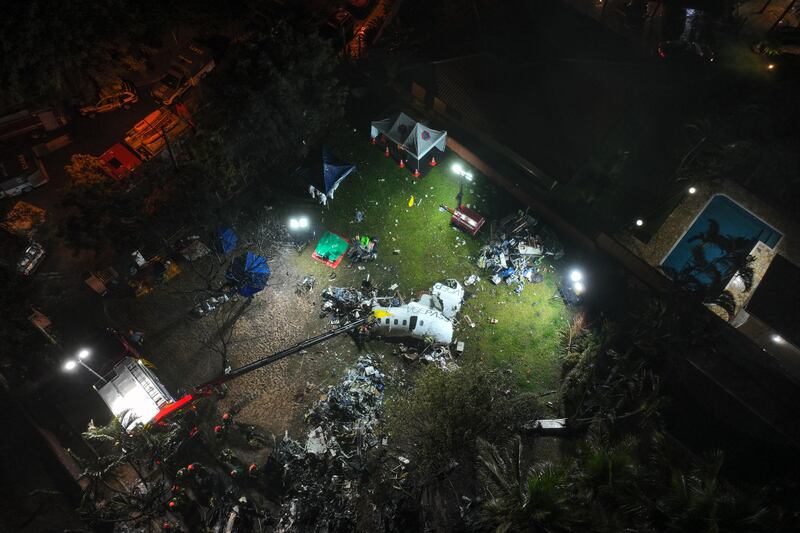 Sao Paulo’s morgue began receiving the bodies on Friday evening (Andre Penner/AP)