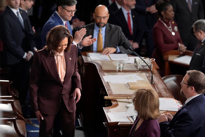 Kamala Harris, left, joined at the top by Speaker of the House Mike Johnson, finishes her role at a joint session of Congress to certify the votes from the Electoral College (J Scott Applewhite/AP)