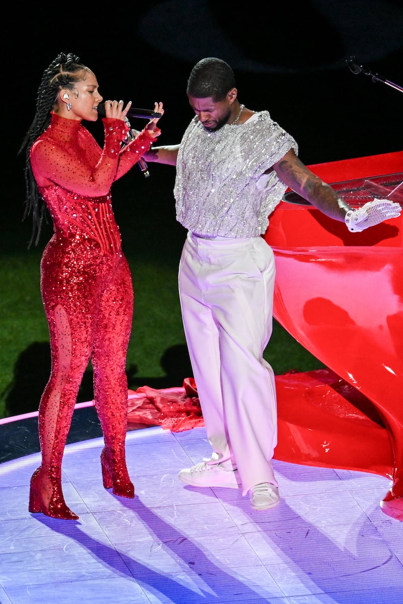 Alicia Keys performs with Usher during the Apple Music Halftime Show at Super Bowl LVIII, Allegiant Stadium, Las Vegas