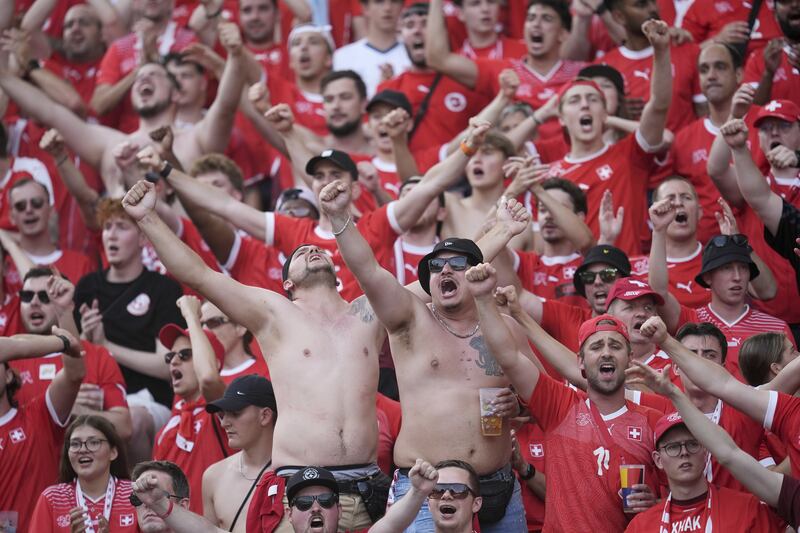 Switzerland fans saw their side beat the defending champions .