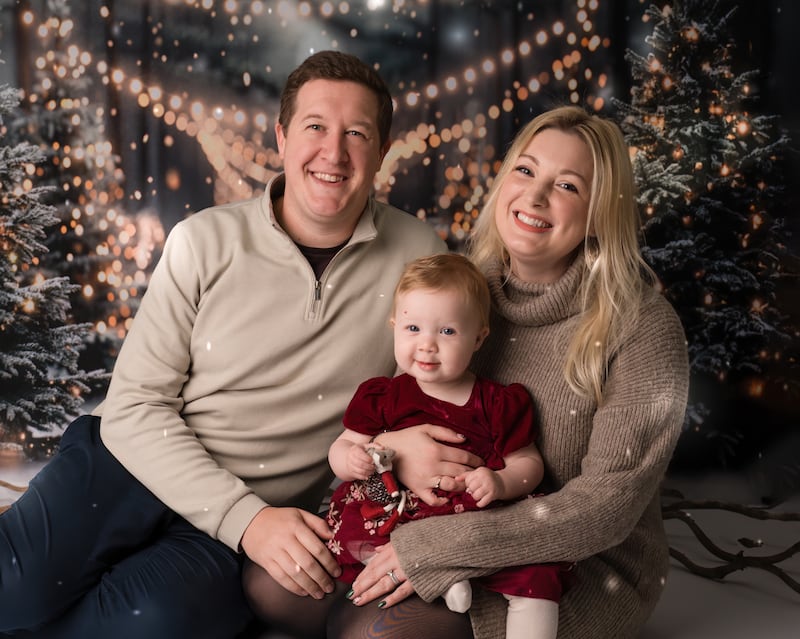 Baby Aurora with her parents Sam and Laura