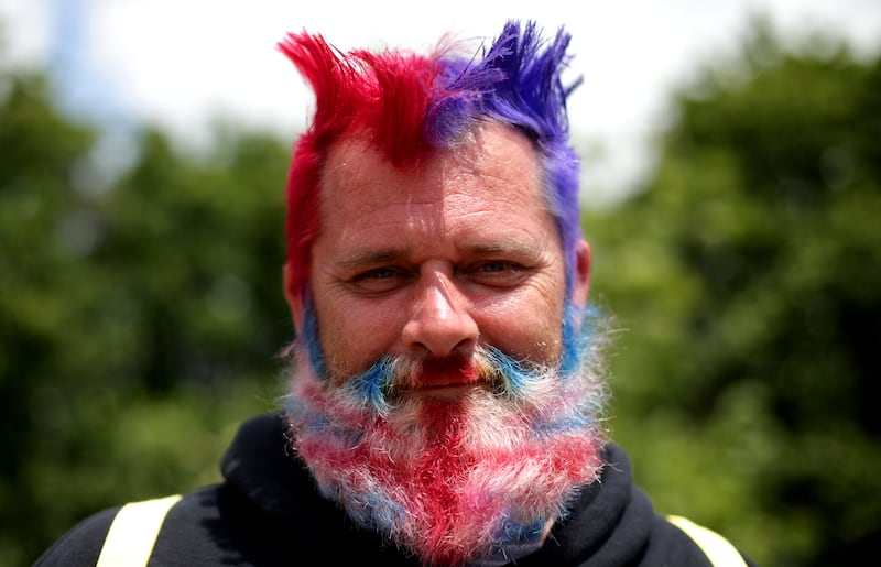 A festivalgoer with a Union Jack beard