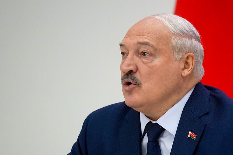 Belarusian President Alexander Lukashenko speaks to the media after voting in presidential elections in Minsk (Pavel Bednyakov/AP)