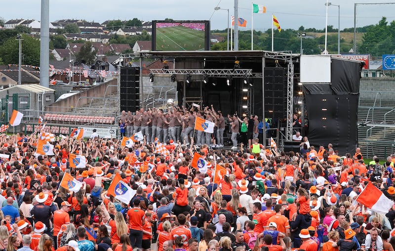 Armagh celebrate with the fans at the Athletic grounds in Armagh on Monday, after winning the All Ireland.
PICTURE COLM LENAGHAN