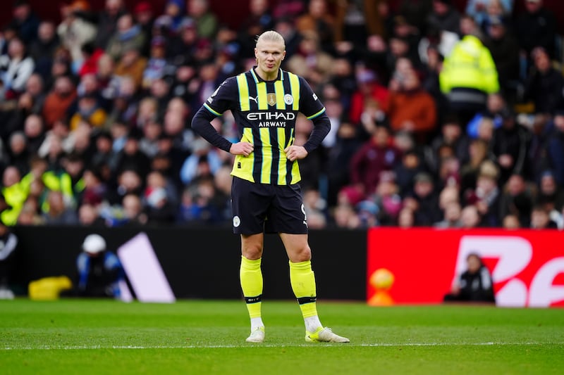 Manchester City’s Erling Haaland stands dejected at Villa Park