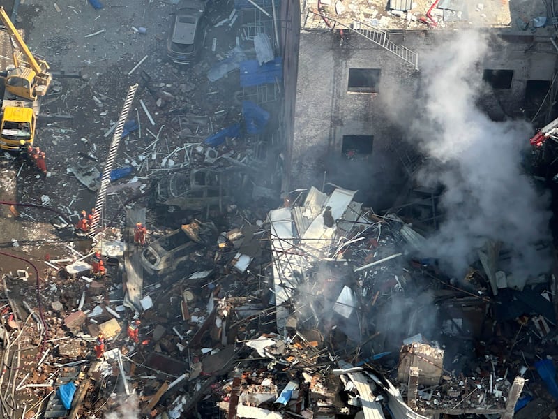 Firefighters work the scene of an explosion in Sanhe city in northern China’s Hebei province on Wednesday (Ng Han Guan/AP)