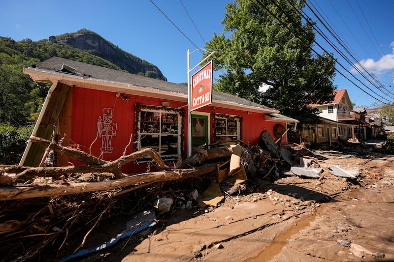 Destroyed buildings in the aftermath of Hurricane Helene (Mike Stewart/AP)