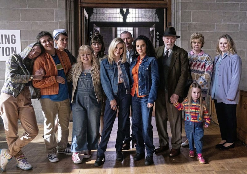 The cast of Derry Girls pictured on the set of the final episode, which was set during the 1998 Good Friday Agreement referendum. 