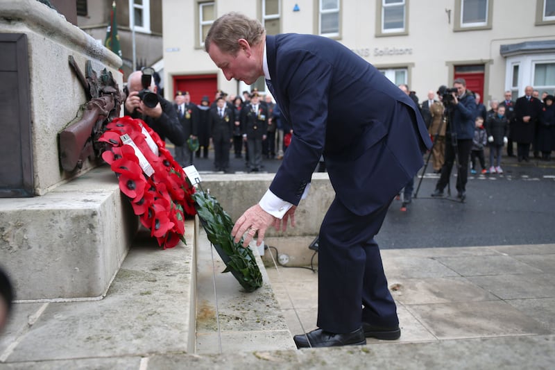 Enda Kenny lays a wreath at a Remembrance Sunday service at the Cenotaph in Enniskillen