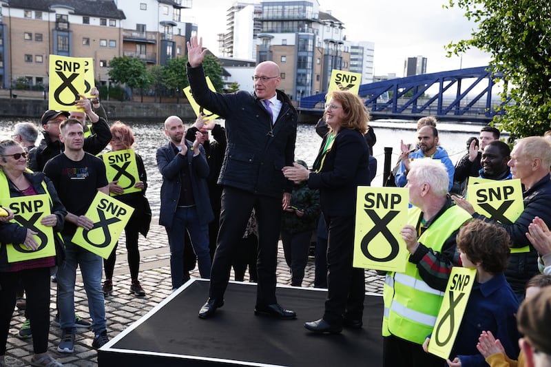 Scottish First Minister and SNP leader John Swinney gives a speech with SNP parliamentary candidate for Edinburgh North and Leith, Deidre Brock in Leith