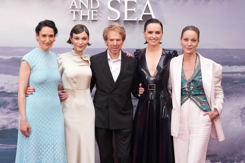 (left to right) Sian Clifford, Tilda Cobham-Hervey, Jerry Bruckheimer, Daisy Ridley and Jeanette Hain attend the gala screening of Young Woman And The Sea at the Curzon Mayfair in London
