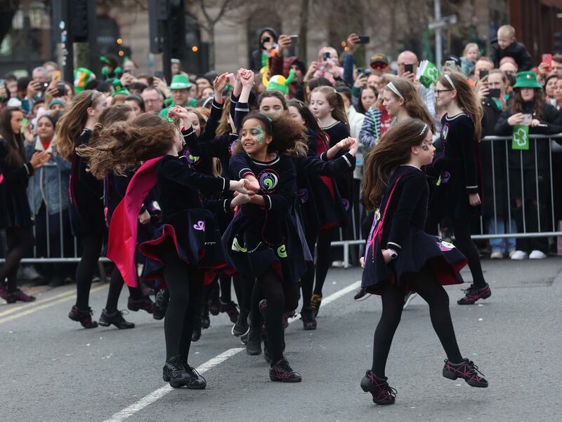 Performers entertain the crowd as  Thousands line the streets for the St Patrick’s day Parade in Belfast on Sunday.
PICTURE COLM LENAGHAN