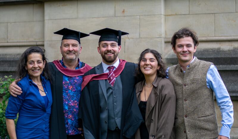 Mr Clothier with his youngest son Carter (centre), wife Helen, daughter Tiger and son Quito, at his graduation